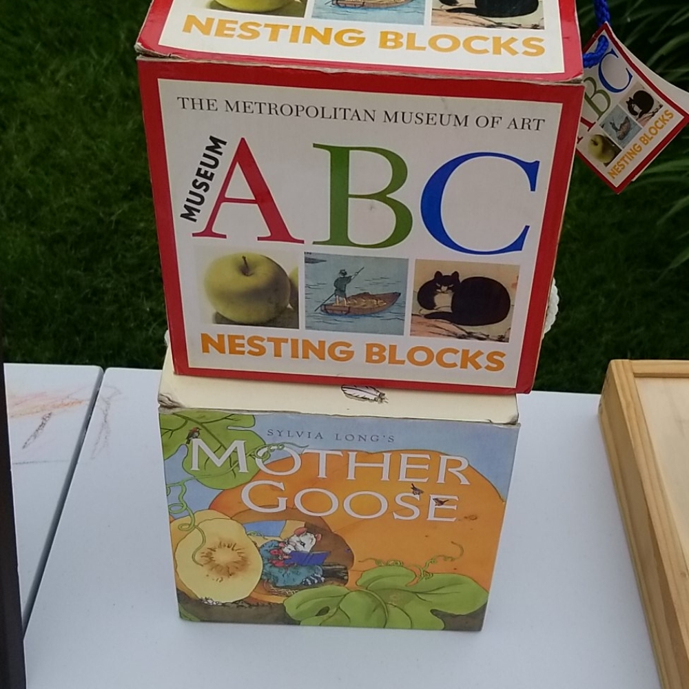 Two sets of nesting blocks